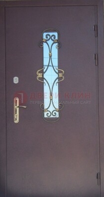 Металлическая дверь со стеклом и ковкой ДСК-77 в Оренбурге